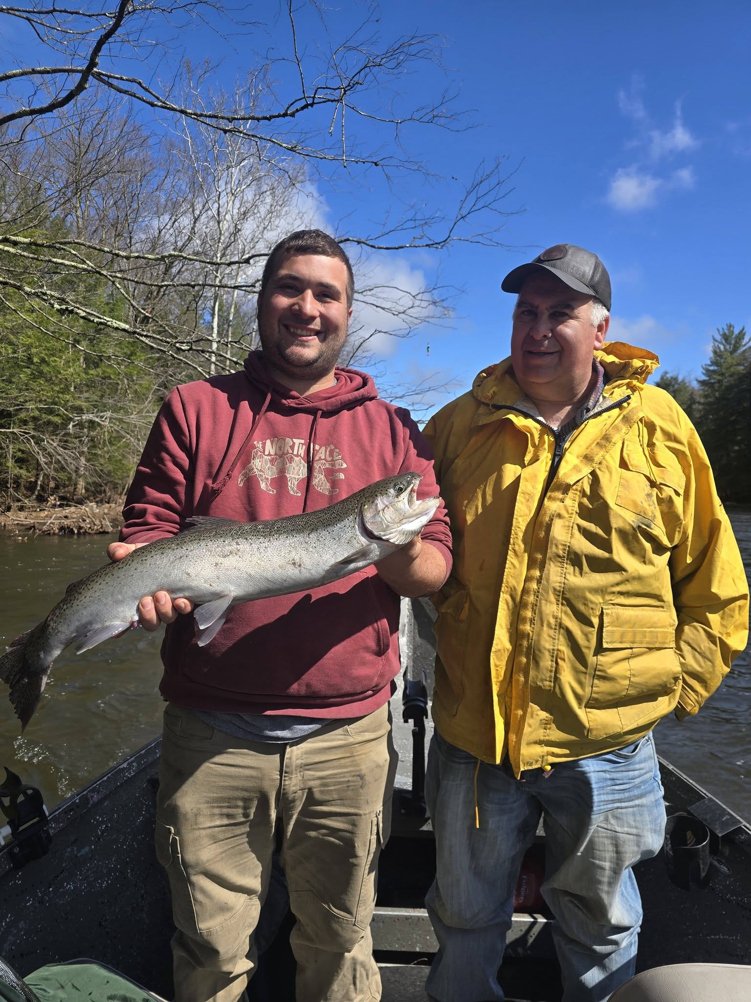 Large fish catch displayed on fishing boat in Altmar NY river setting
