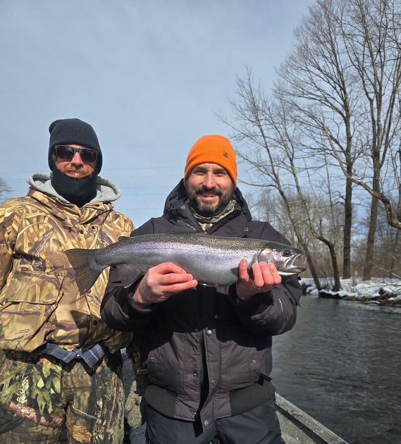 Rainbow trout catch displayed during winter fishing trip in Altmar NY