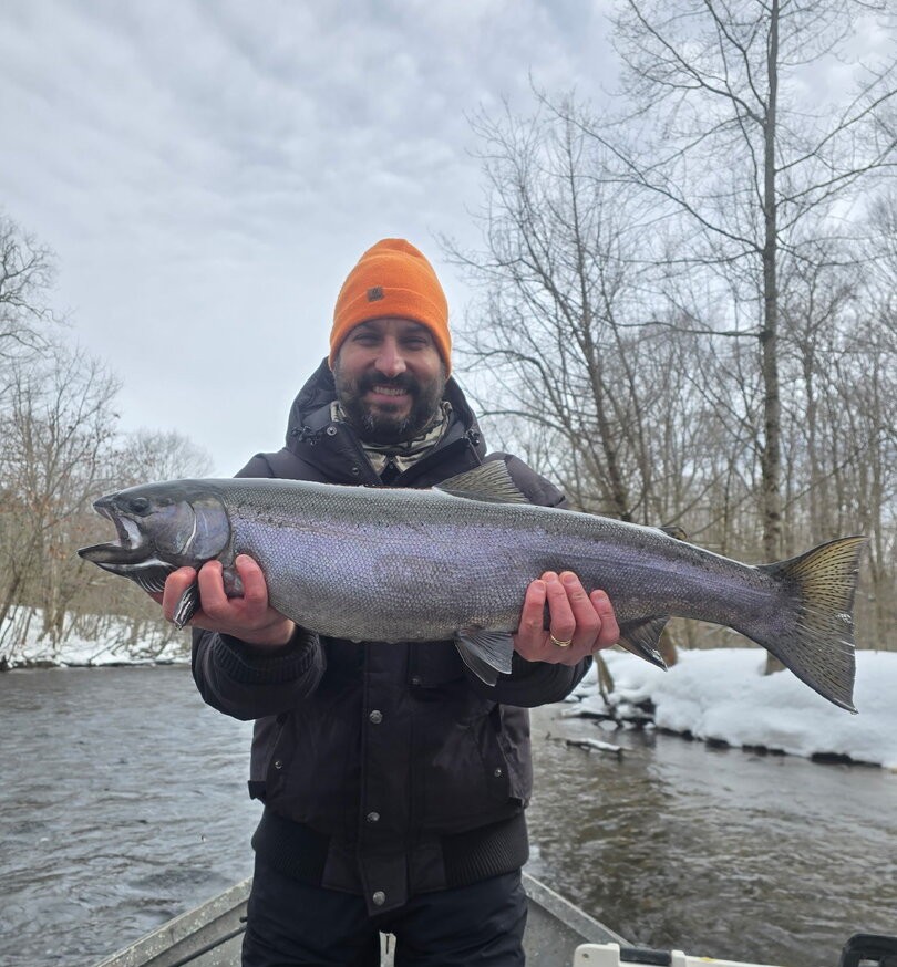 Large steelhead trout caught while fishing in winter conditions near Altmar NY