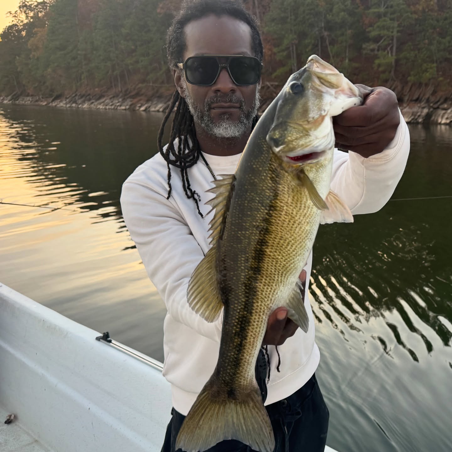 Angler catching a largemouth bass in Atlanta