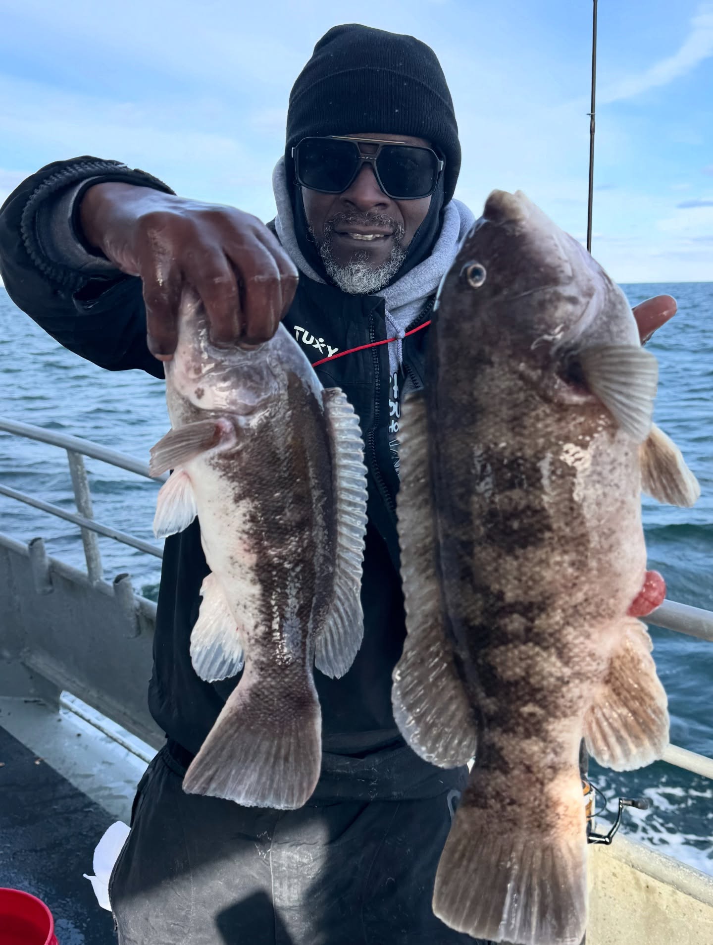 Two tautog fish caught while fishing in Atlanta