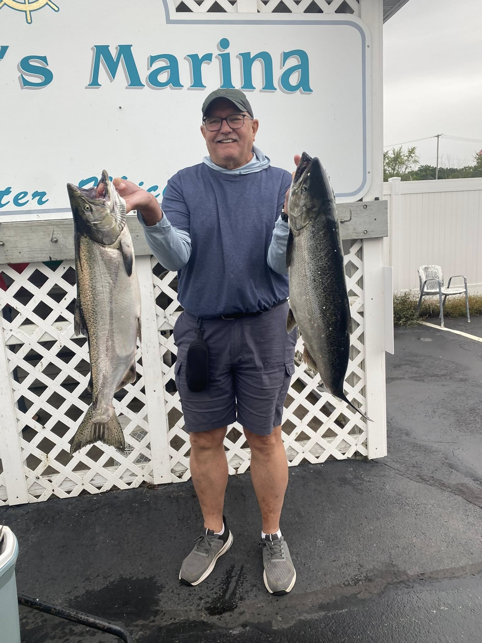 Two large salmon caught during fishing trip in Pentwater MI marina