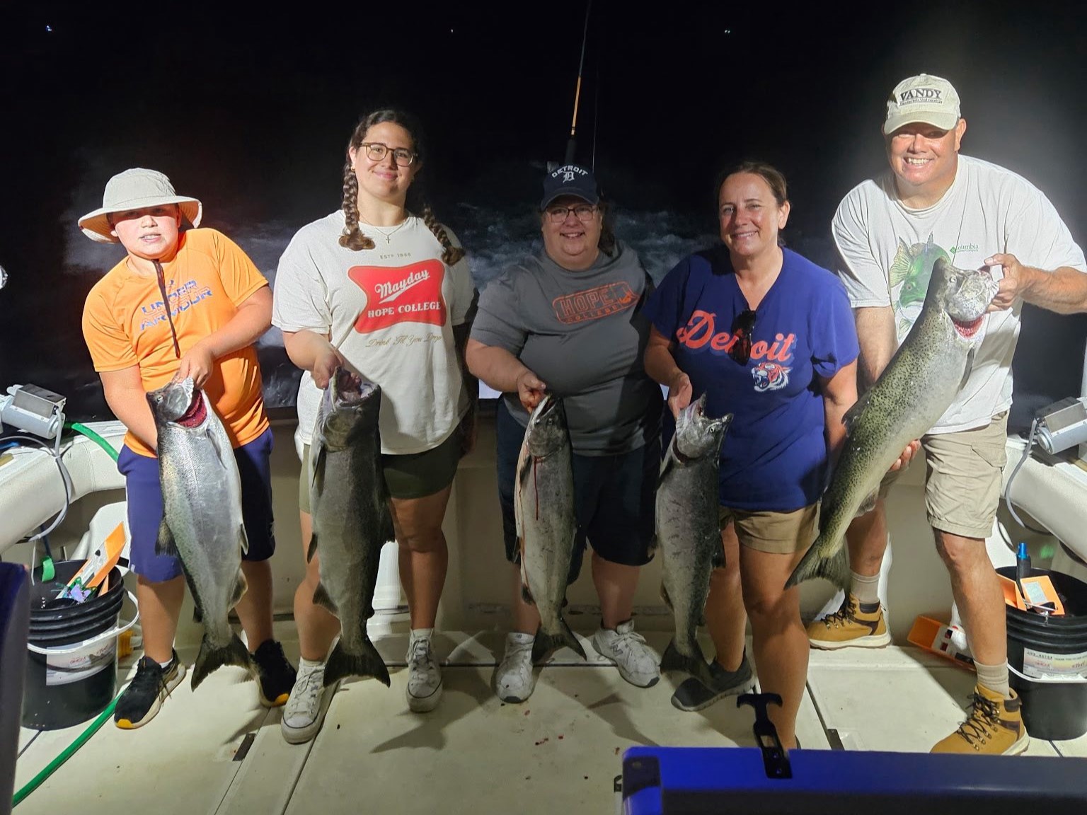 Lake Michigan salmon fishing charter boat trolling for king salmon and trout at sunset