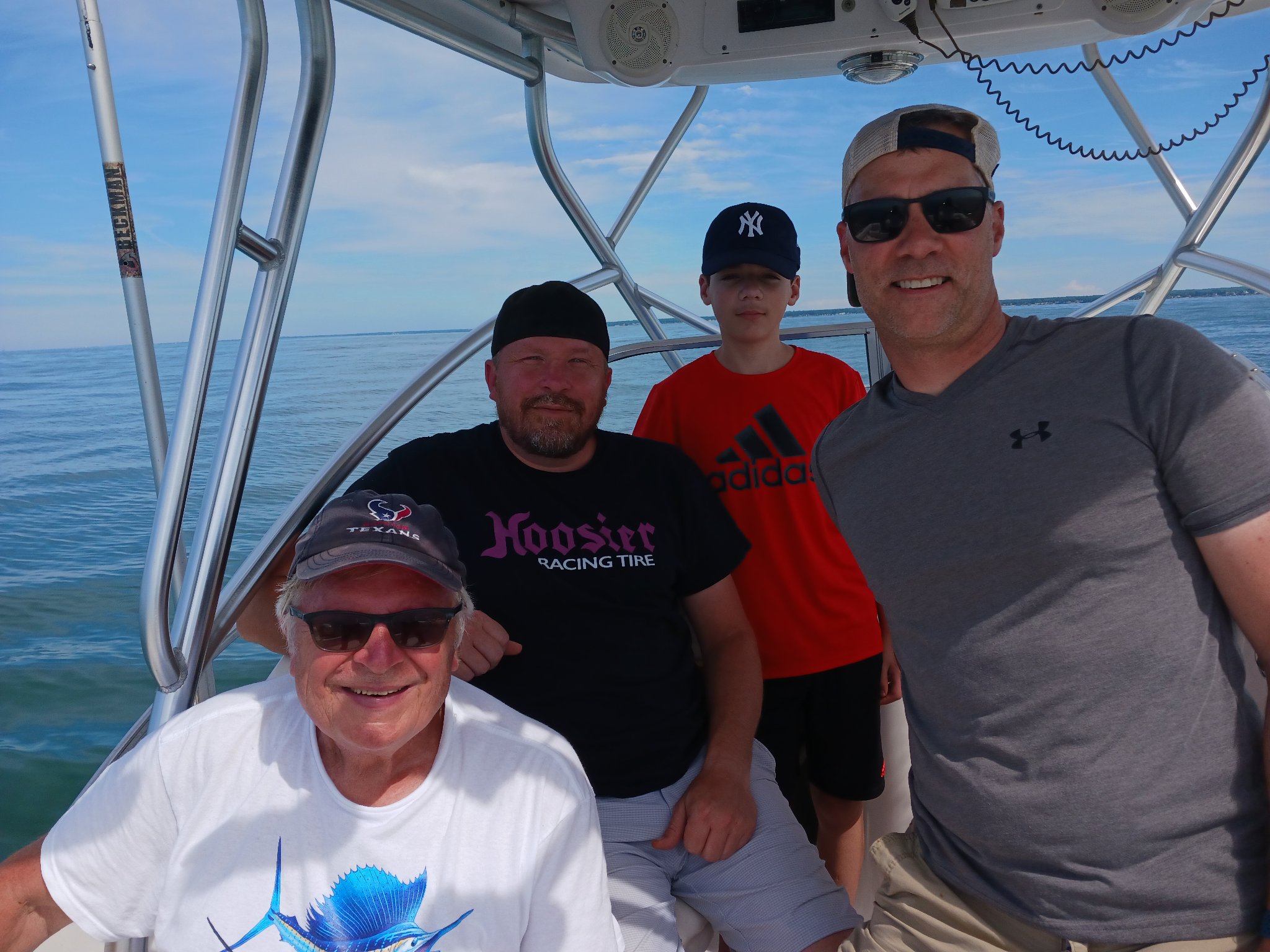A group of 4 people fishing at Vermilion