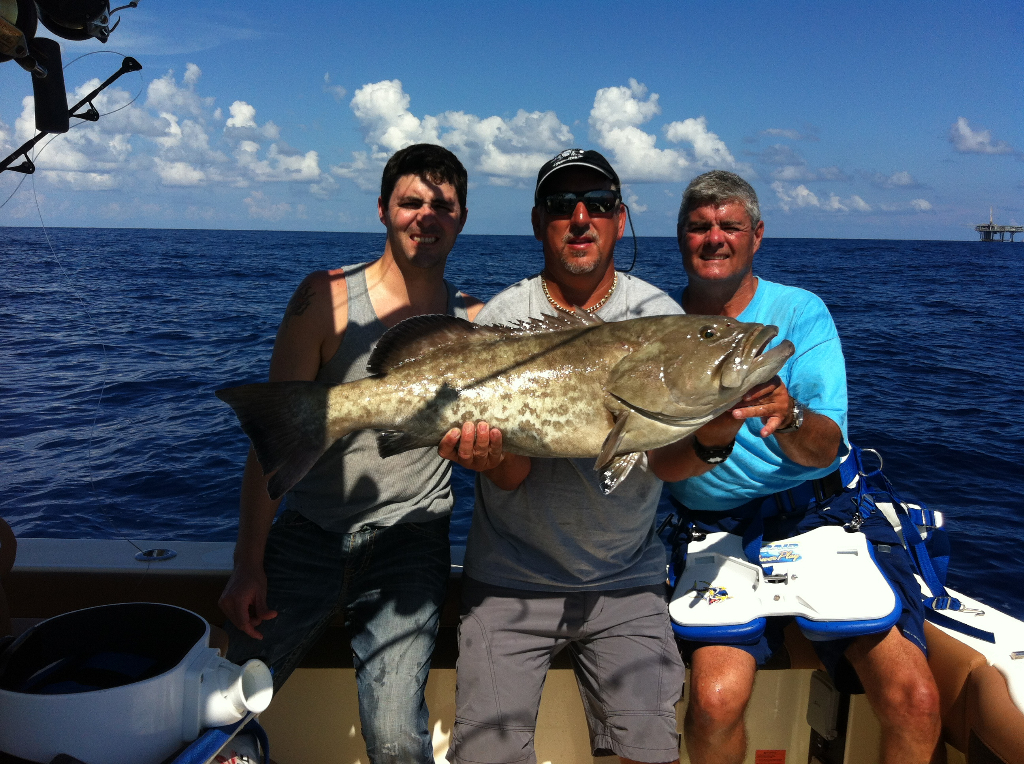 8-hour offshore fishing boat trip 30-40 miles from shore catching red snapper and trout