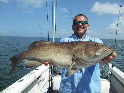 One angler holding a 30-inch fish in Palmetto