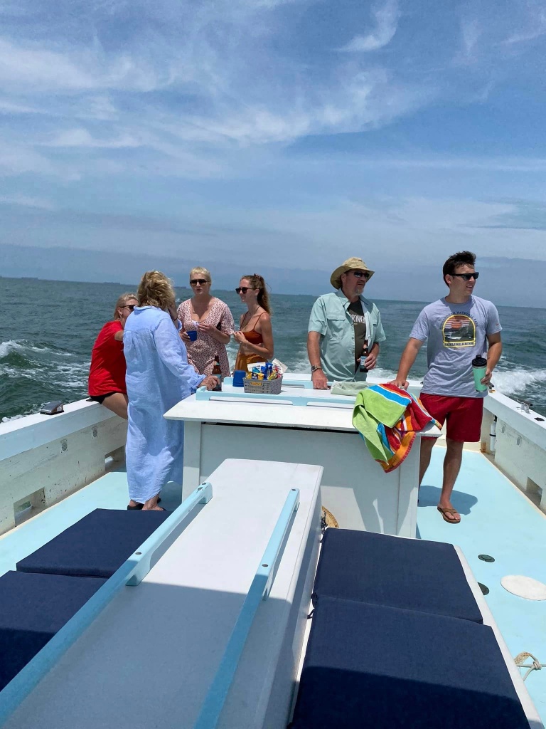 5 people fishing on the coast of Cape Charles