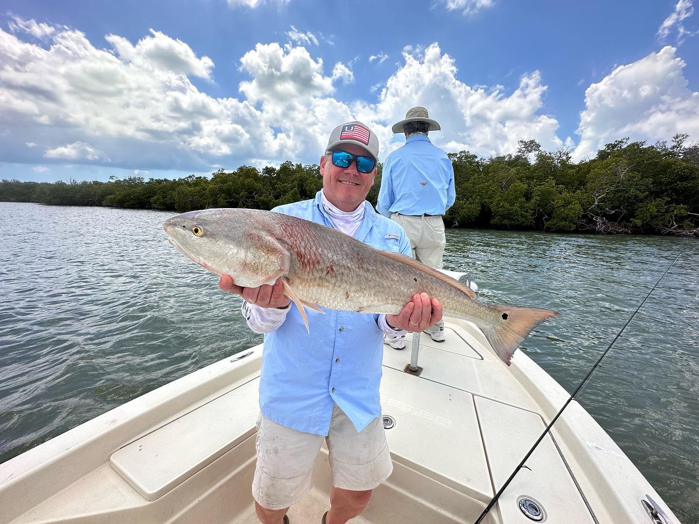 Angler reeling in a 33-inch catch in FL