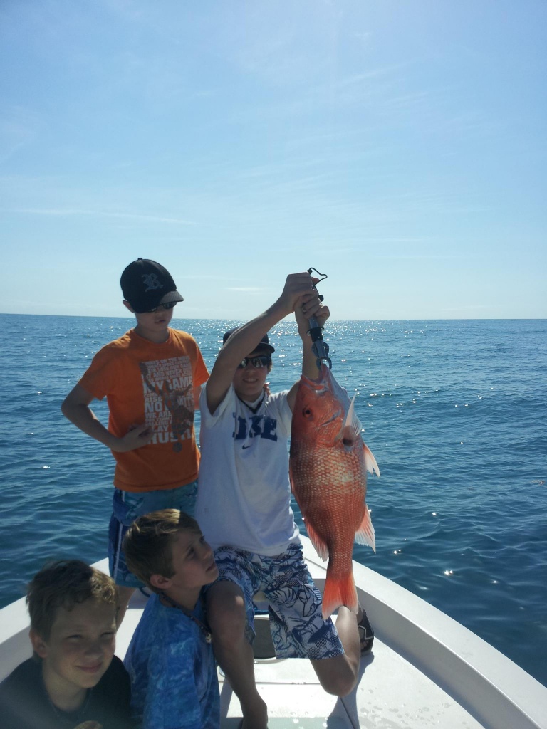 A group of 4 people fishing in Florida