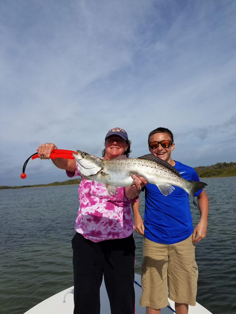 Fishing at New Smyrna Beach with two people