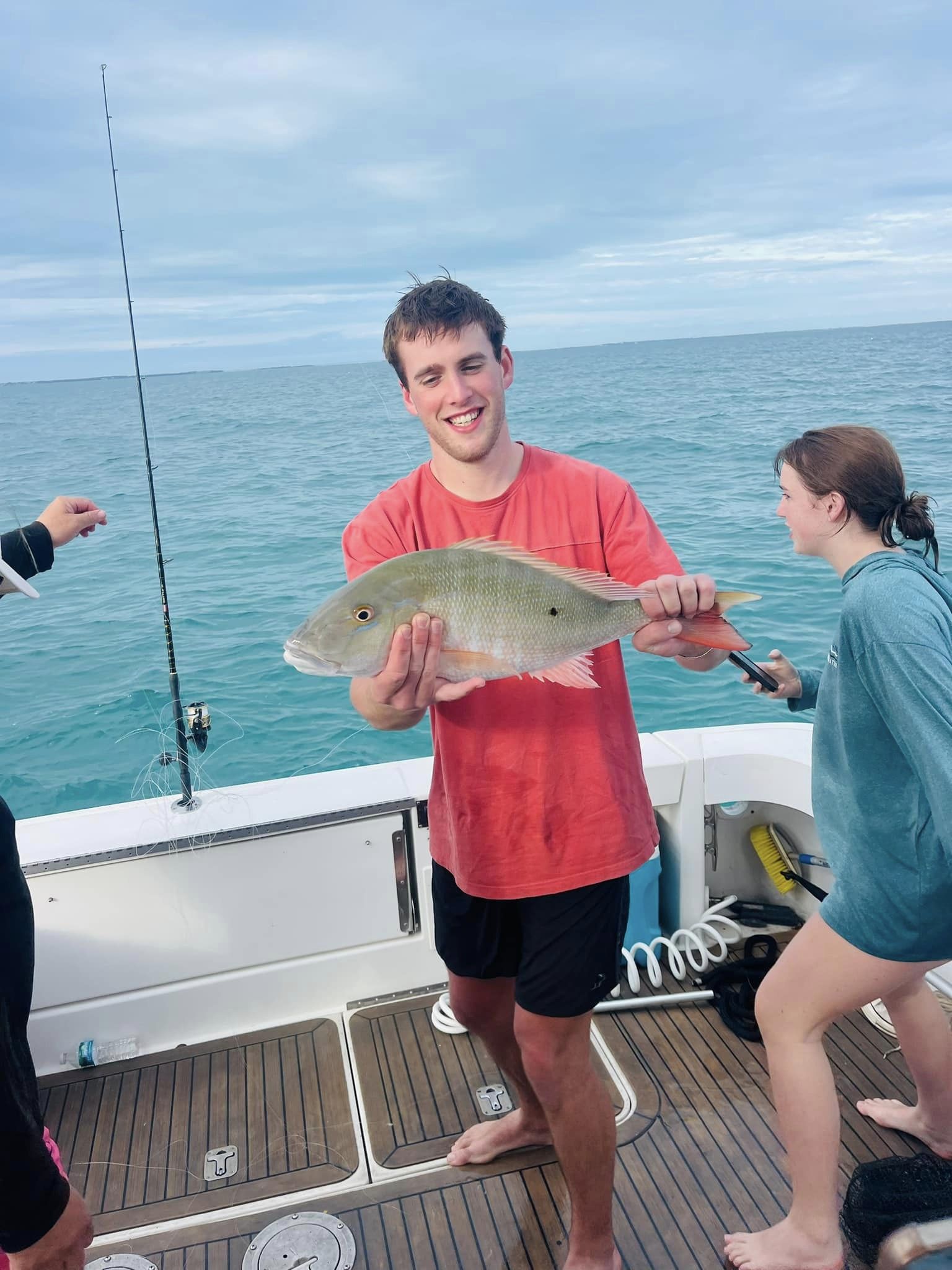 Mutton snapper fish caught by two anglers in Islamorada
