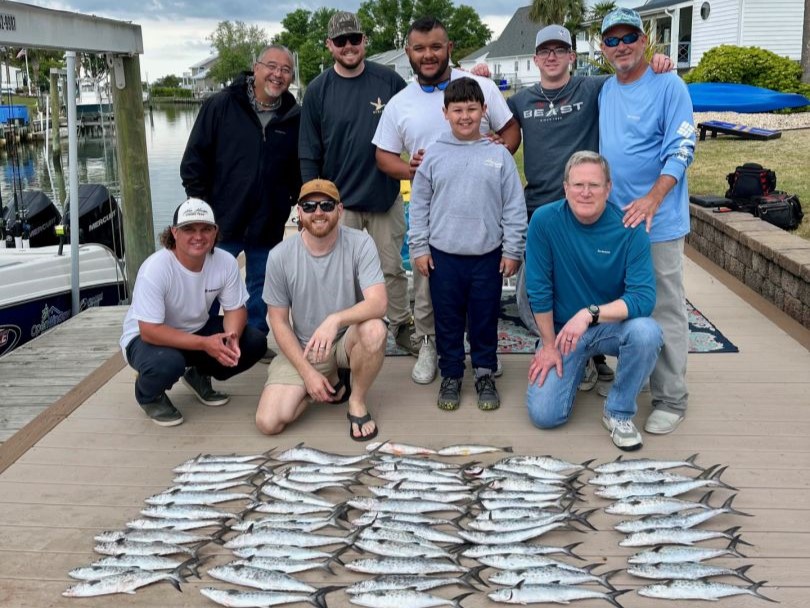 Group of 9 people fishing in North Carolina