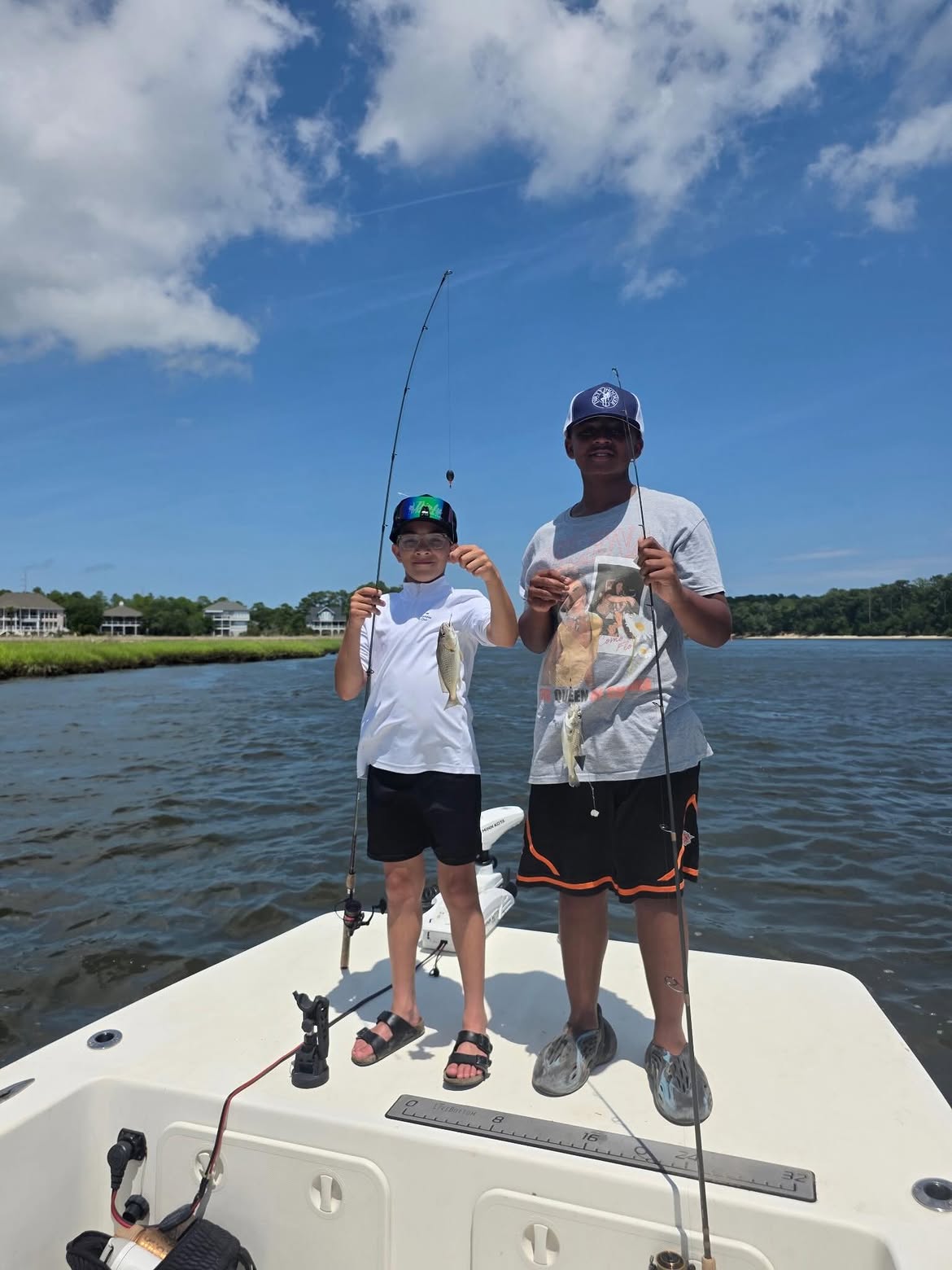Fishing trip on boat in Carolina Beach NC waters with caught fish displayed
