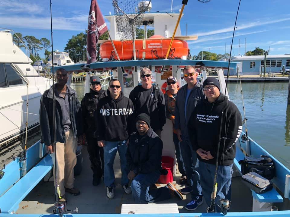 A group of 8 people enjoying a day out in Hampton