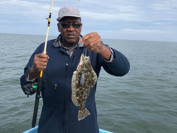 Lone fisherman in Hampton, catching the best moments