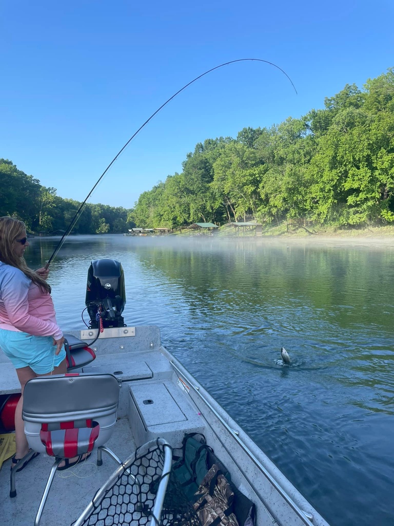 A person fishing in Heber Springs