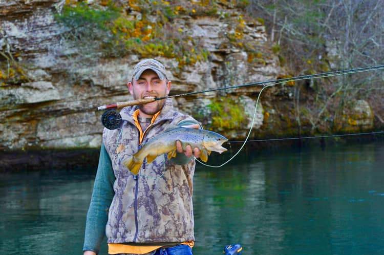A lone angler fishing in the beautiful Heber Springs location