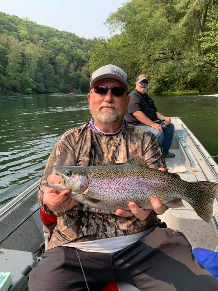 A single rainbow trout caught fishing in AR