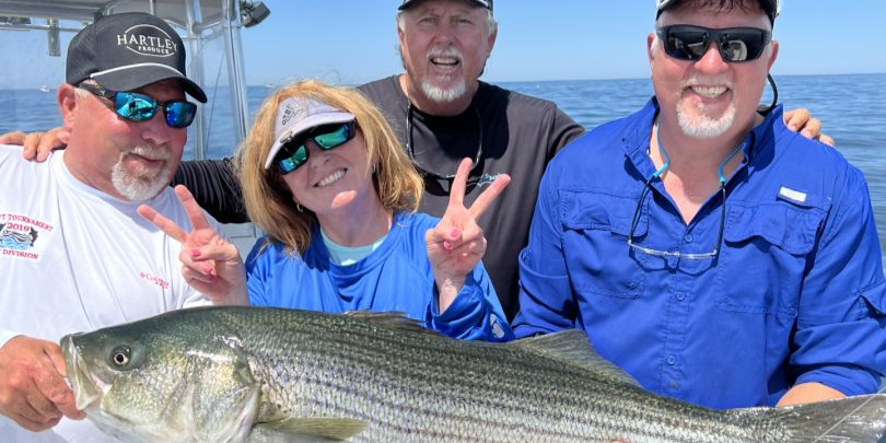 A group of 4 people fishing in Plymouth