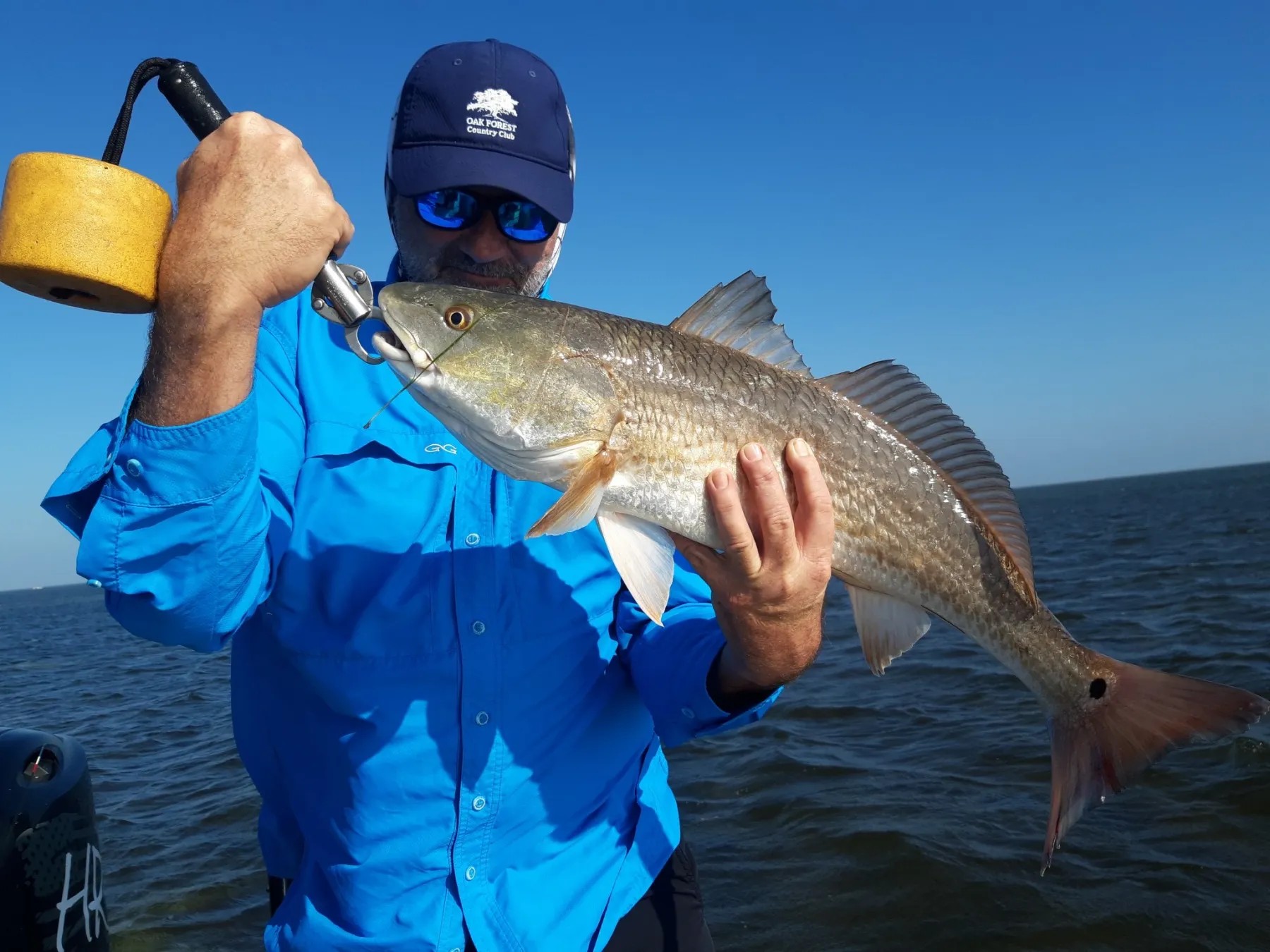 Inshore fishing boat on Laguna Madre waters near South Padre Island targeting redfish and trout
