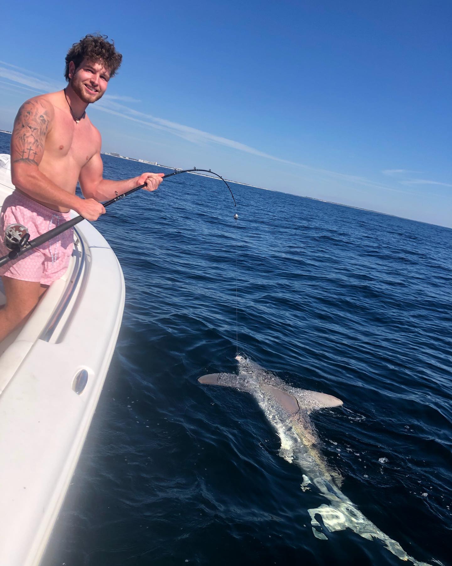 A person enjoying fishing at Panama City Beach