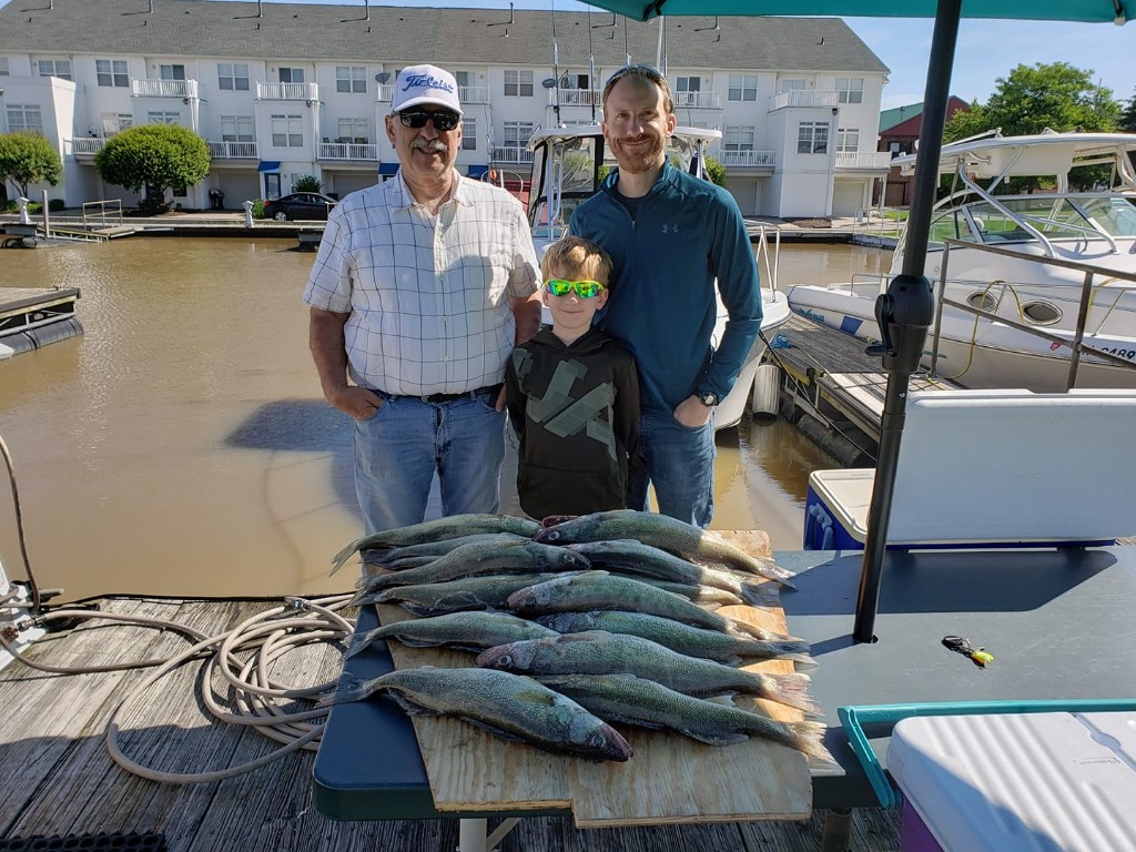 Successful anglers with a fish in Lorain