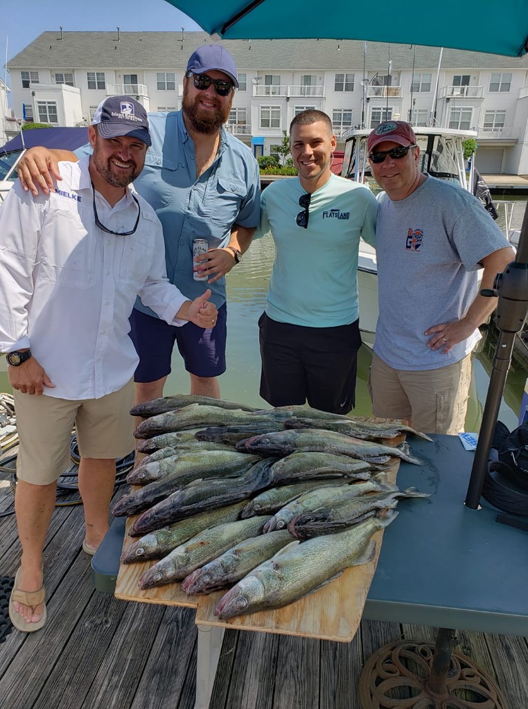 A group of 4 people fishing in Lorain