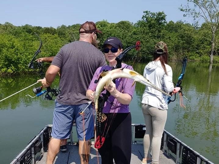 A person enjoying a great fishing trip in MO