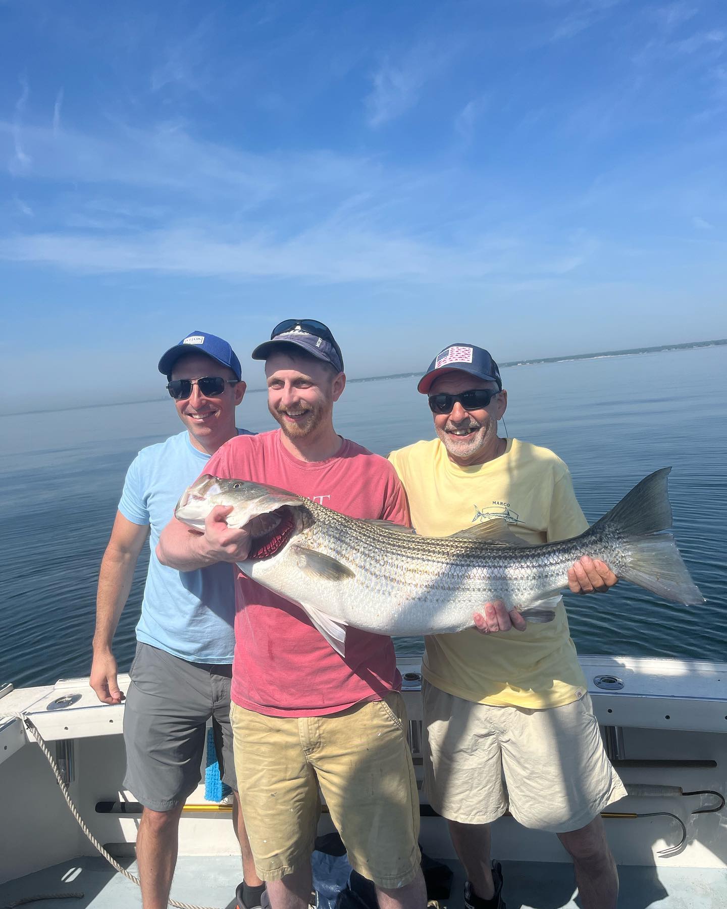 Three people fishing in NY