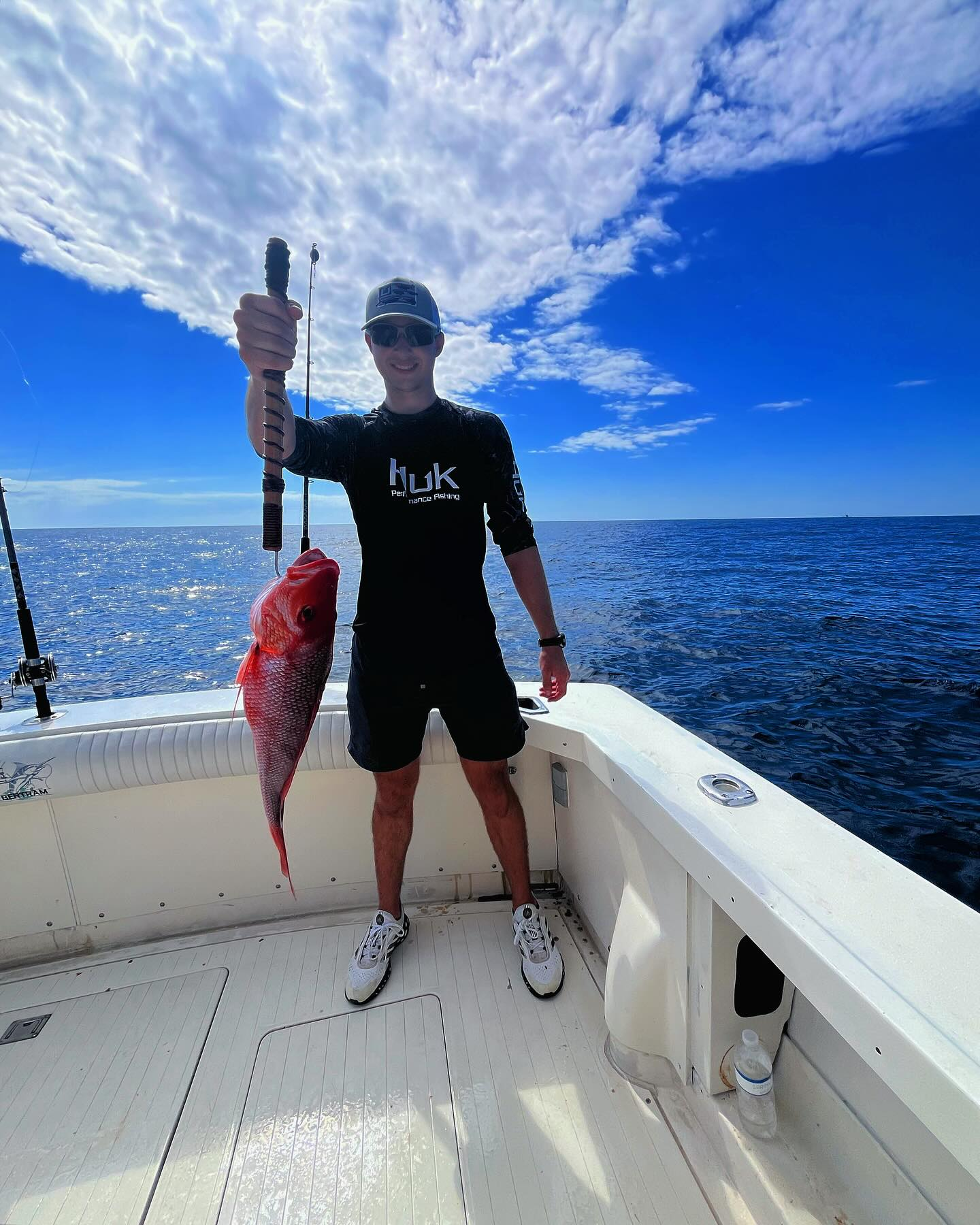 Lone angler reeling in a 23-inch catch at Fort Walton Beach