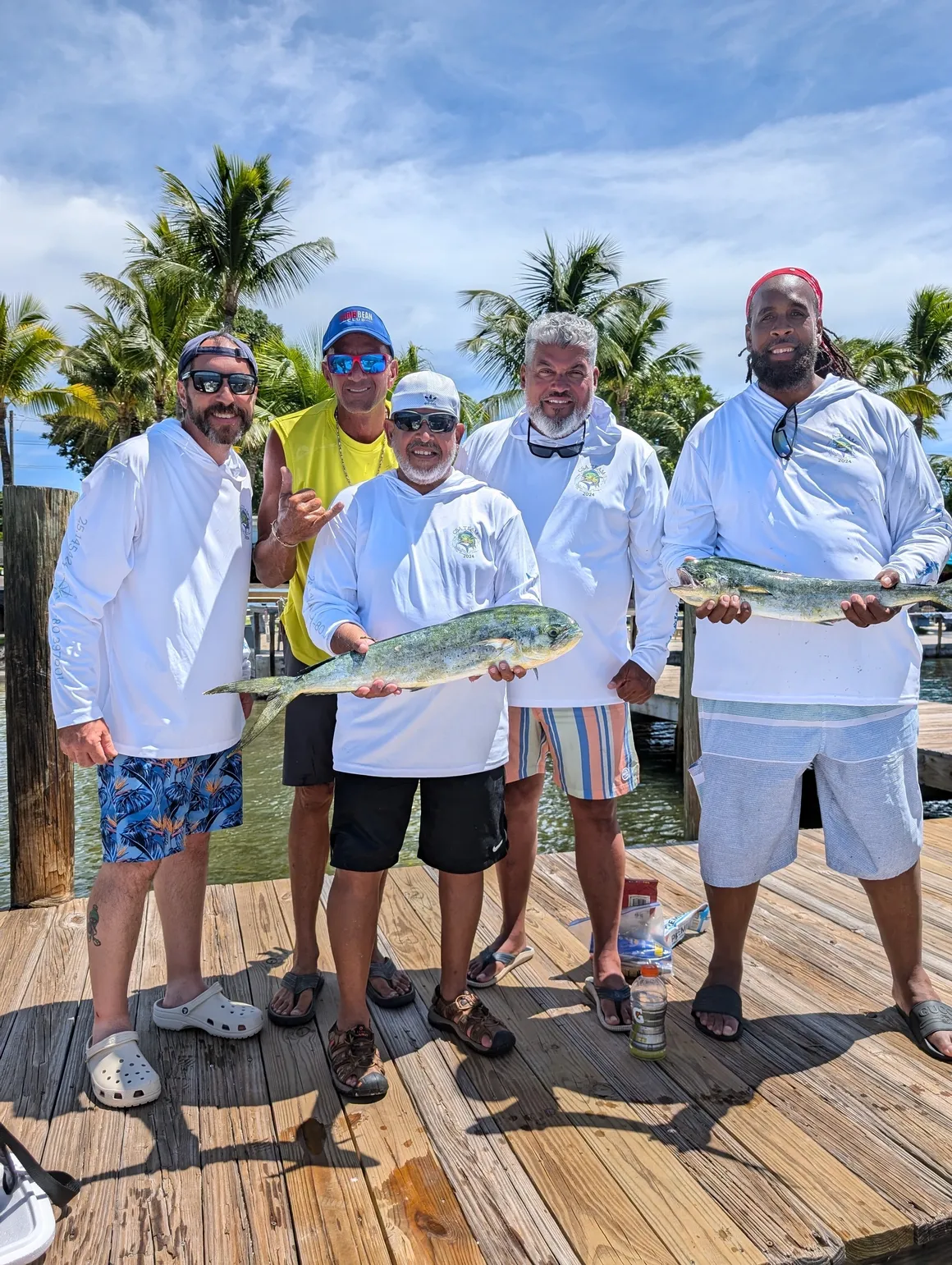 Two big fish being caught in Florida while fishing and water sports