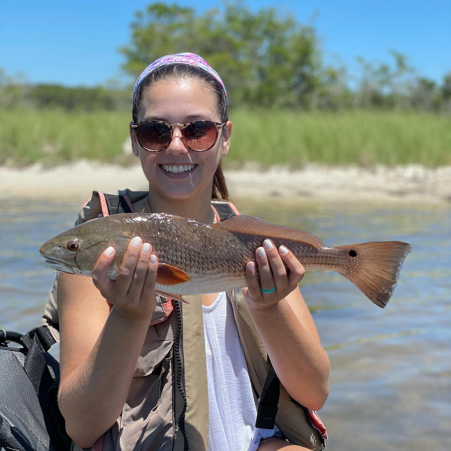 A single redfish measuring 18 inches, caught in Destin