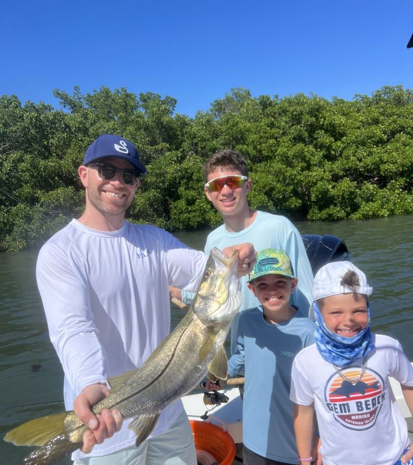 A group of 4 people fishing in Florida