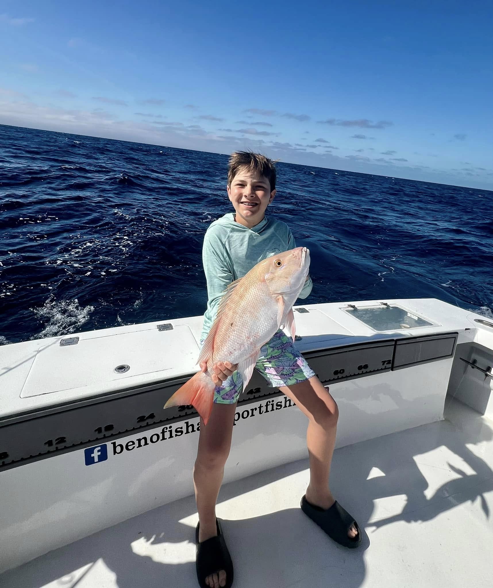 Angler holding a 19-inch fish in FL