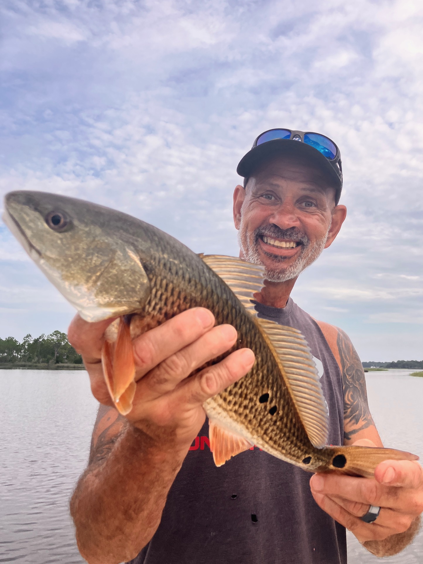 Redfish catch during fishing tour in Bagdad FL