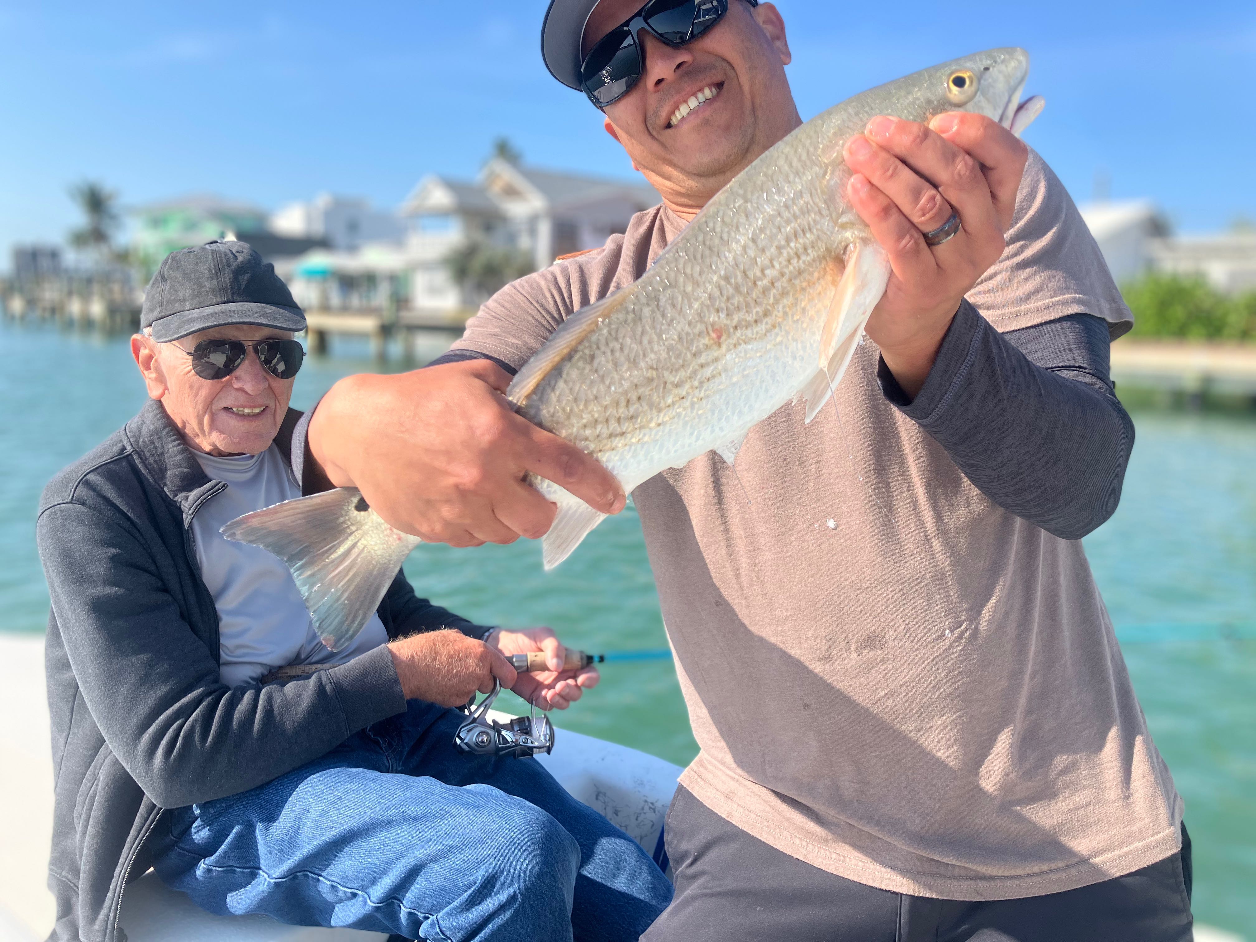 Angler holding a 20-inch fish in FL