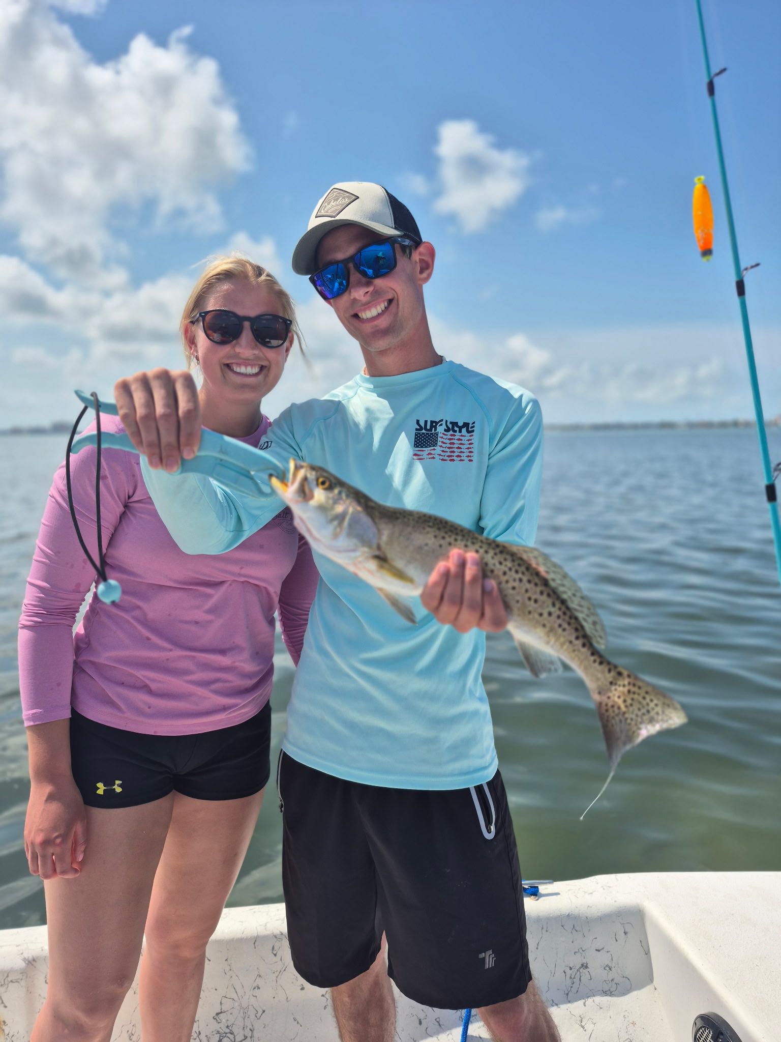 Two people fishing on Treasure Island