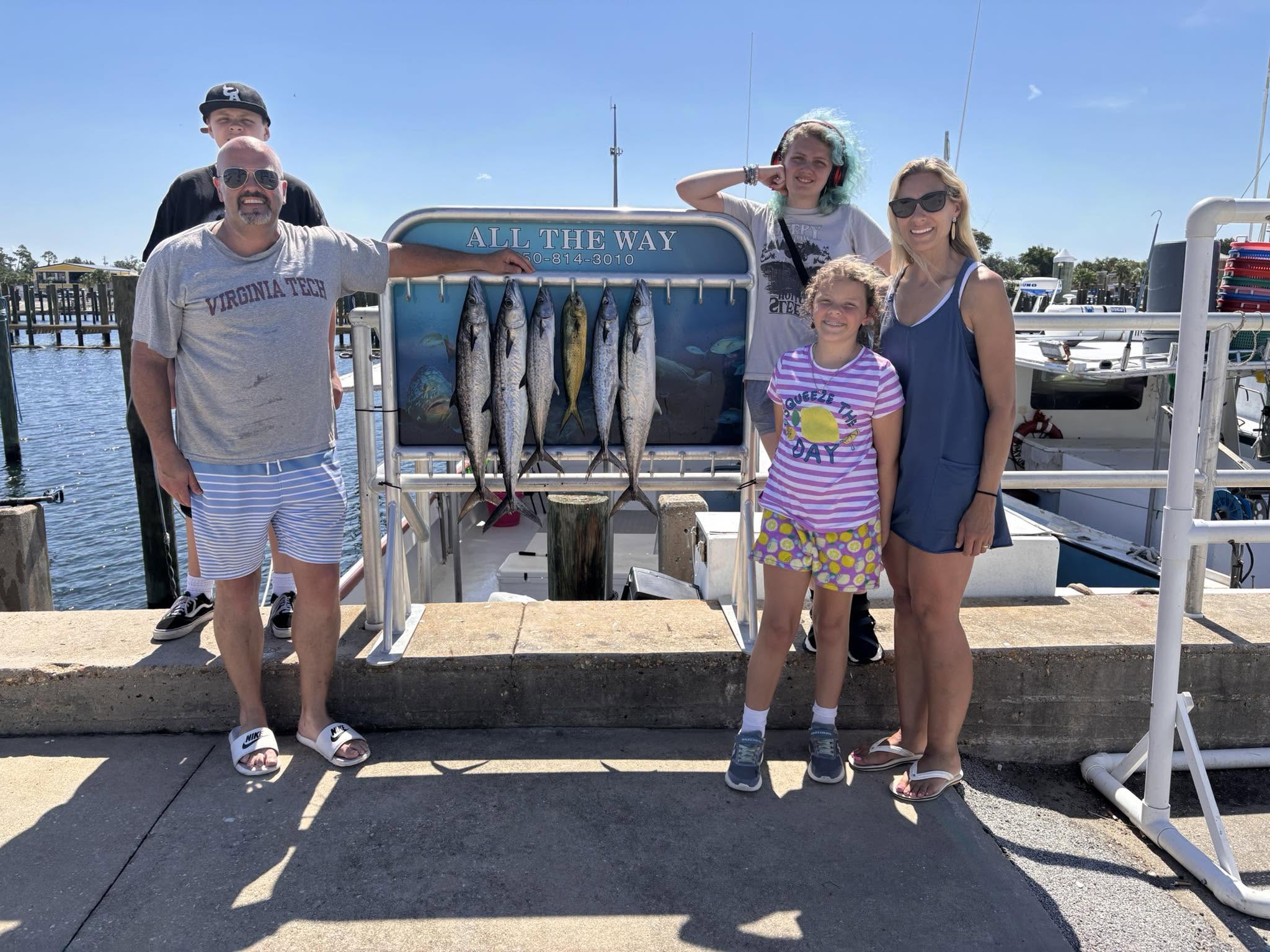 Fresh caught mahi mahi displayed on fishing boat rack at Panama City FL marina