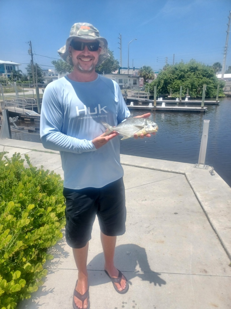 Photograph of a Florida Pompano fish measuring 8 inches