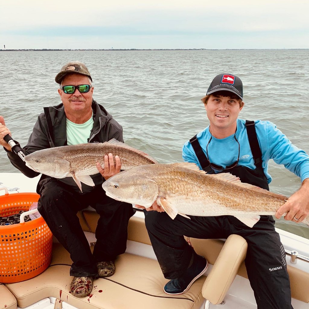 Two people enjoying a fishing trip in SC