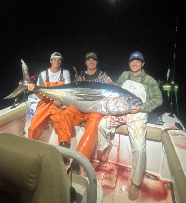 Three people enjoying a fishing trip in New Jersey