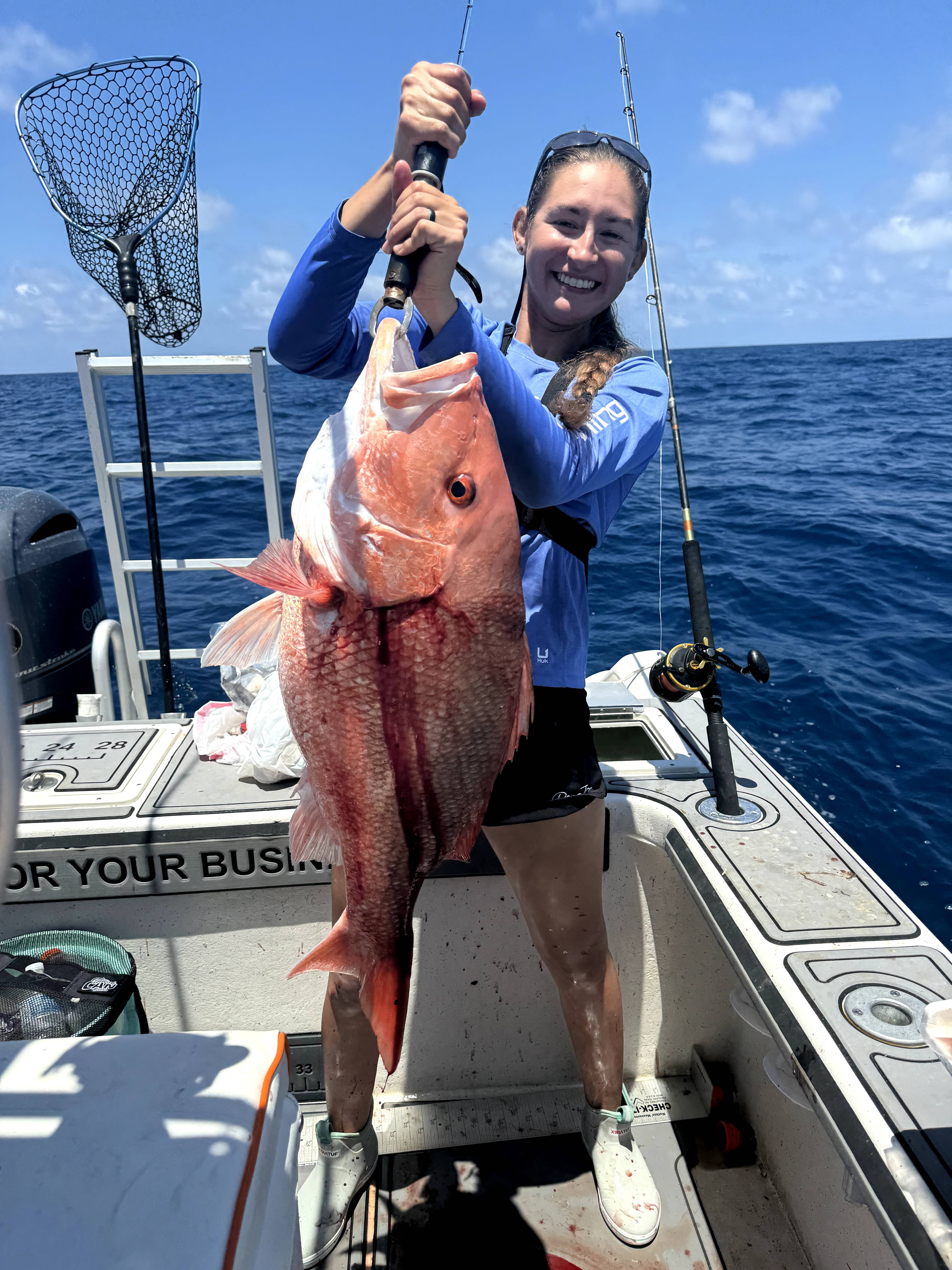 Angler catching a 29-inch fish in Crystal River