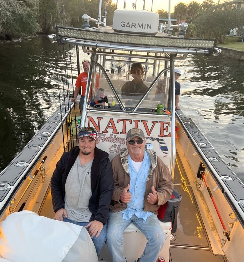 Four people enjoying fishing adventure in Crystal River