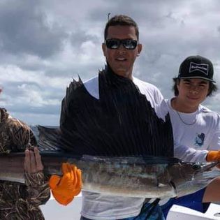Anglers enjoying a day of fishing in Jupiter