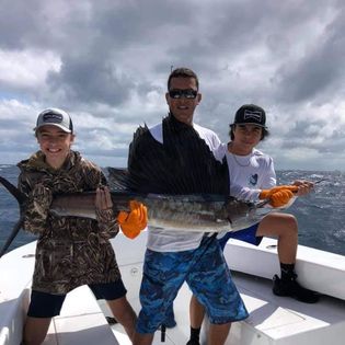 Anglers with a big fish in FL