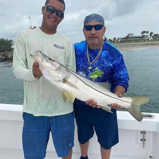 Angler with a 23-inch snook catch in FL