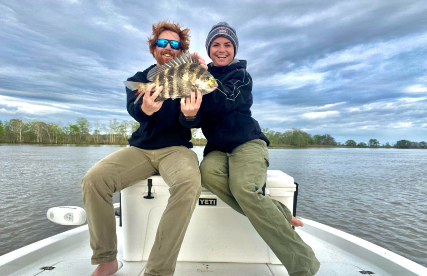 Sheepshead fish caught by two people fishing in Alabama
