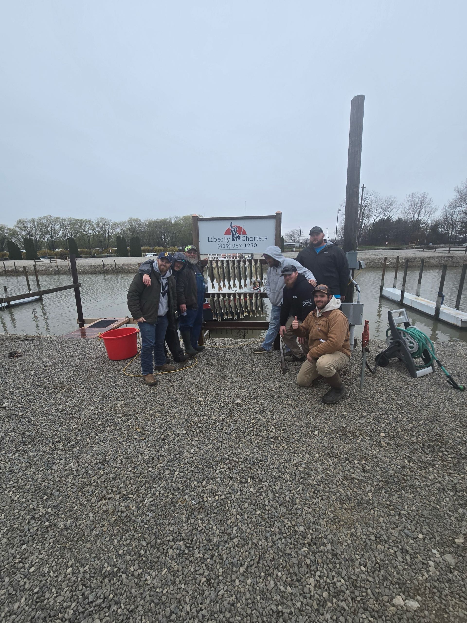 Group of 7 people enjoying outdoor fishing adventure in OH