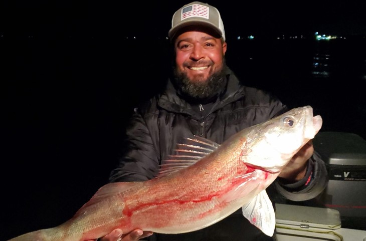 Angler with a big fish catch in Oak Harbor