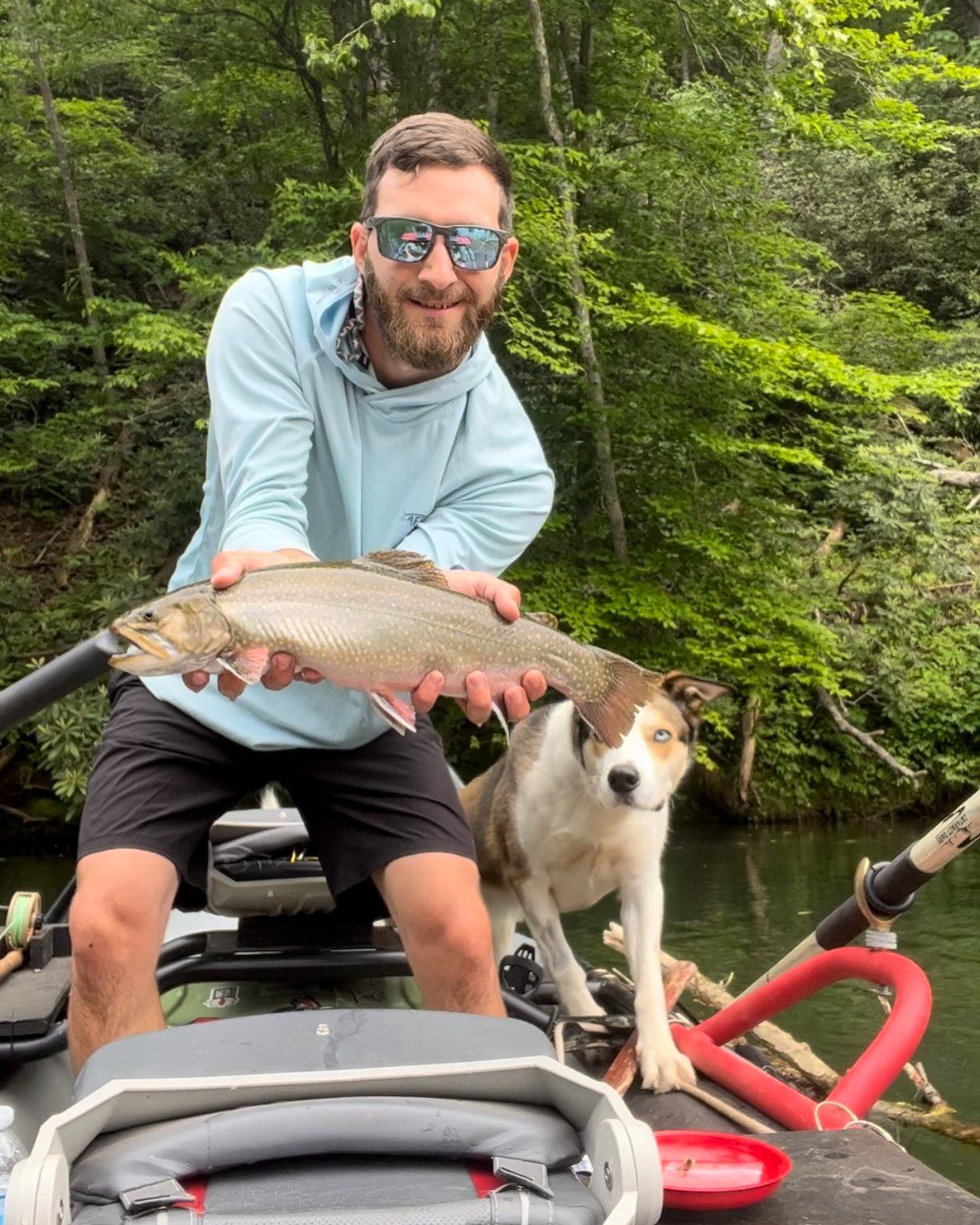Angler with a rainbow trout in Virginia